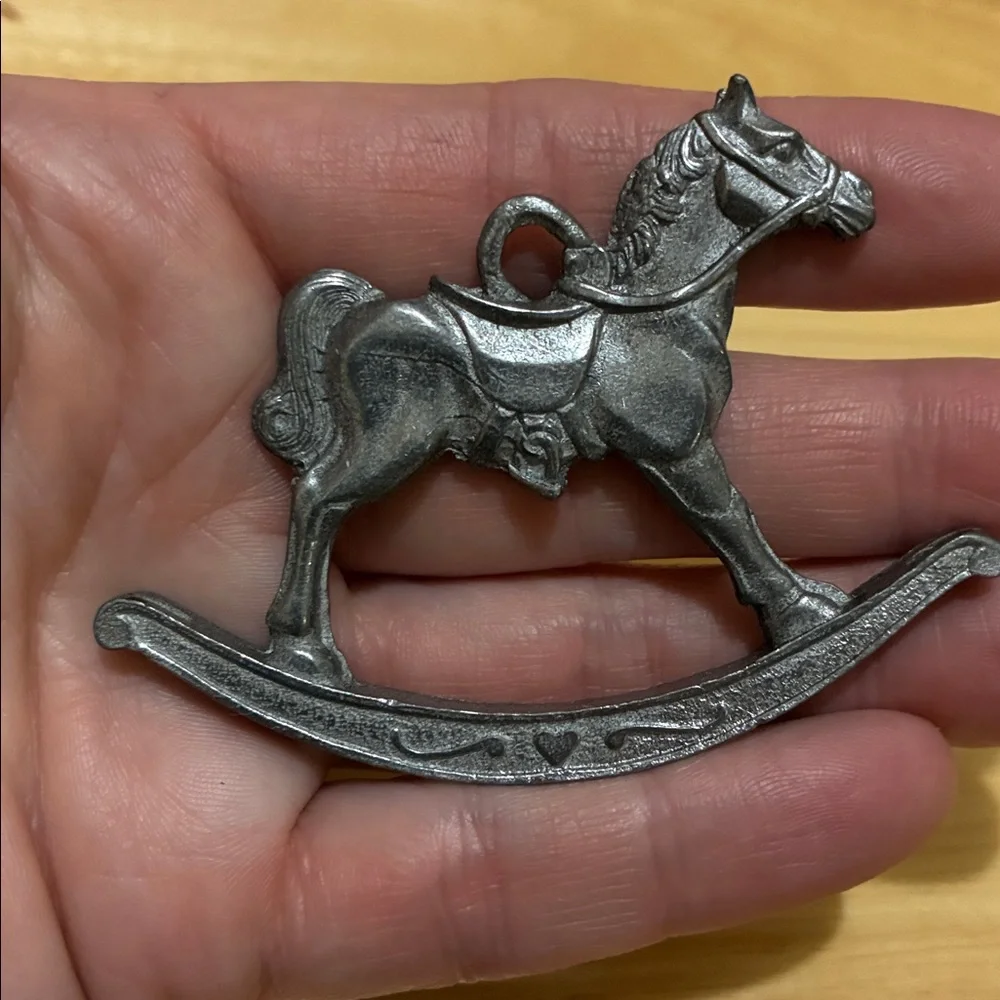 Vintage metal toy horse ornaments.  Rocking horse and stick horse